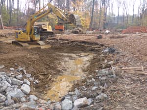 Hazen developed designs for each site to restore stable channel form and function while providing cost-effective long-term protection for existing sanitary, water, and stormwater infrastructure.